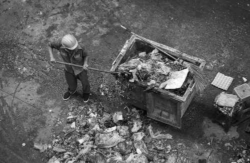 Construction site with builders waste being removed in Ilford
