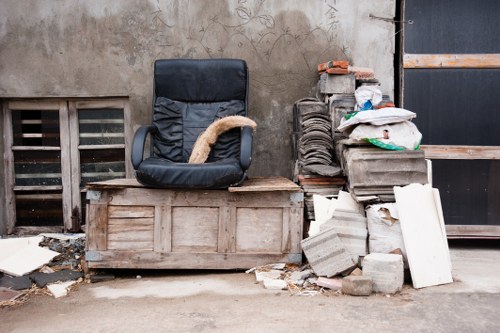 Community sorting waste at a recycling point in Ilford